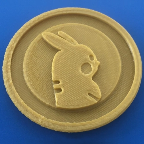 Монета покемона, напечатанная на 3D-принтере