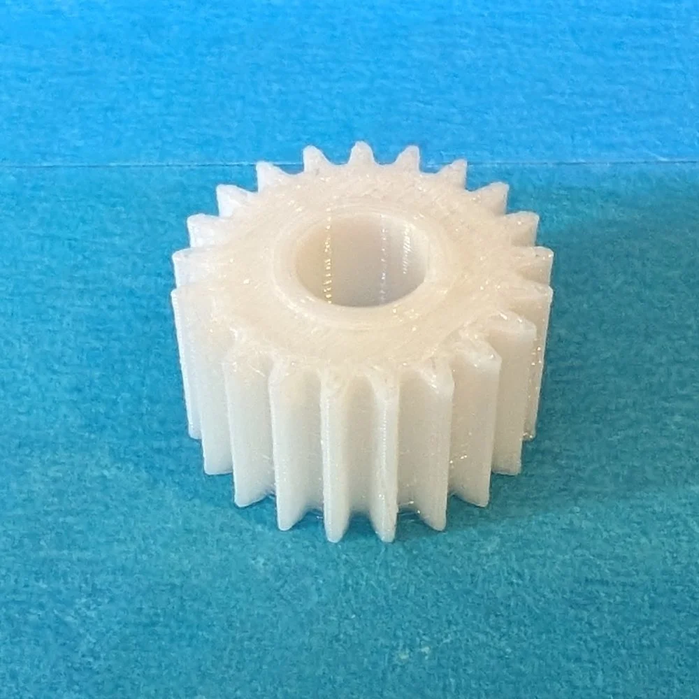 En 3D-printad liten kugge